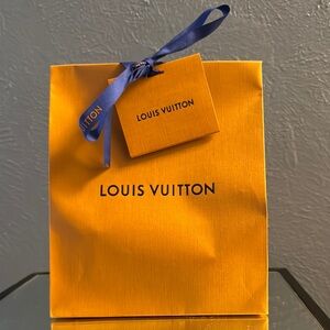 Louis Vuitton Bright Orange Bag with Blue Ribbon